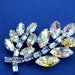 Vintage AB Rhinestone Brooch. Signed B David, Highly Colorful Irredescent Aurora Borealis and Baby Blue Rhinestones.