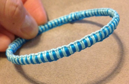 Macramé bangle - turquoise and light blue cord over metal bangle