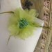 Fancy green flower clip/pin with transparent petals