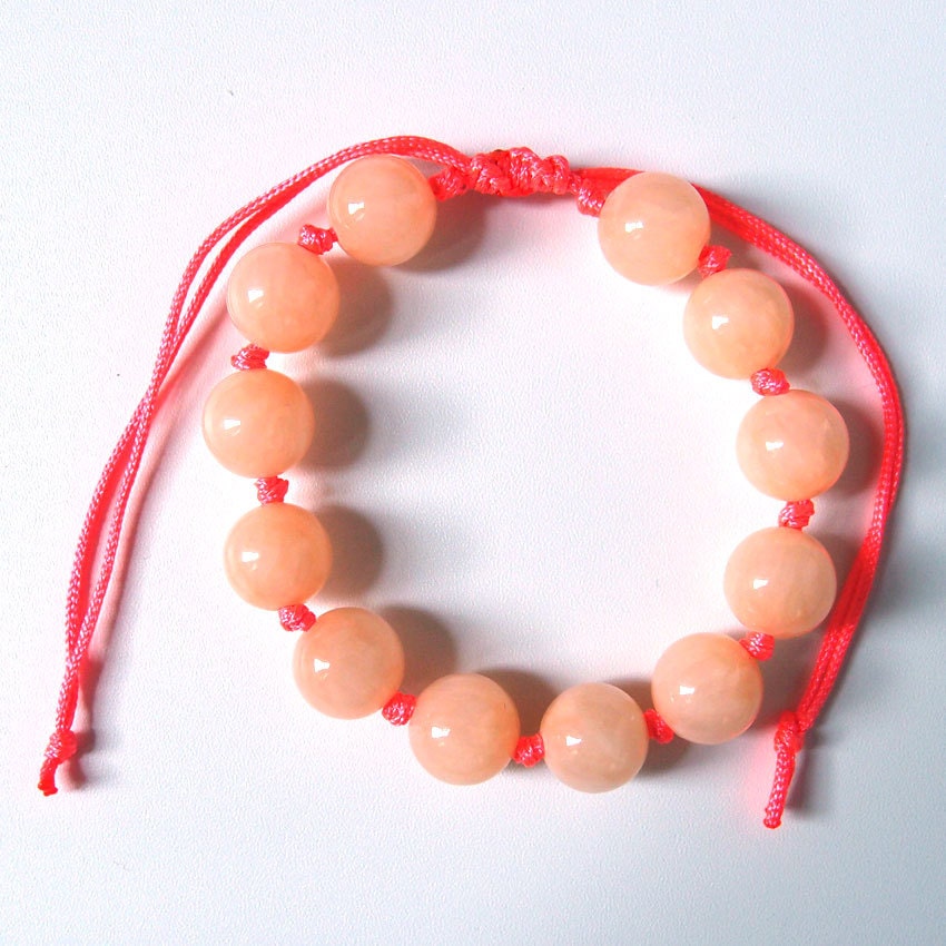 Peach and neon pink beaded bracelet