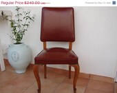SALE 40% OFF EVERYTHING Antique Chair with original red,faux leather covering,brass stud detail,carved legs,hair & spring.