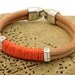 FREE SHIPPING.Unisex leather bracelet.Handmade natural leather, multi strand bracelet with silver plated spacers and clasp.