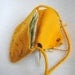 Felted handbag yellow with unique ethnic designs