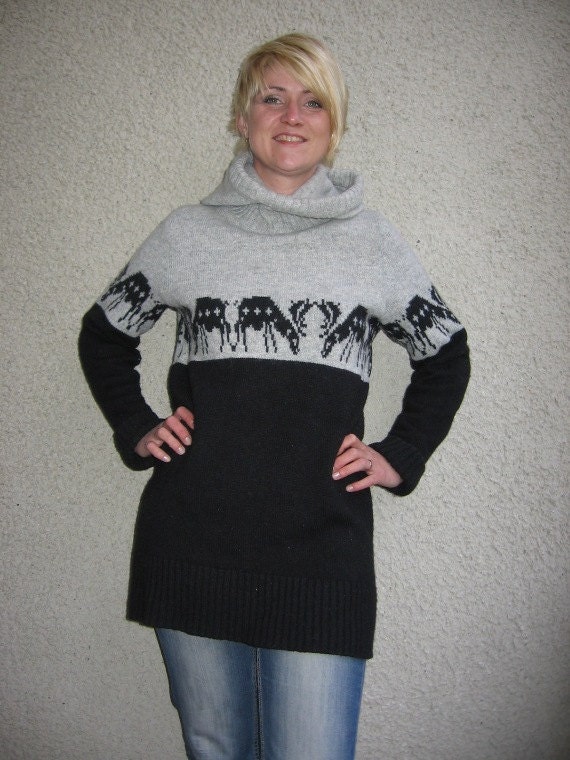 Knitted wool sweater with a hood