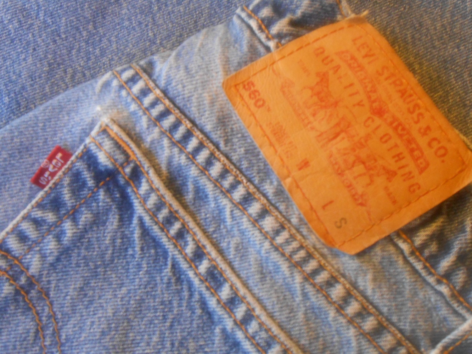 W12MS Levis Women's 560 1980s No Tag Printed Red Tab on Inside Pocket Made in the U.S.A
