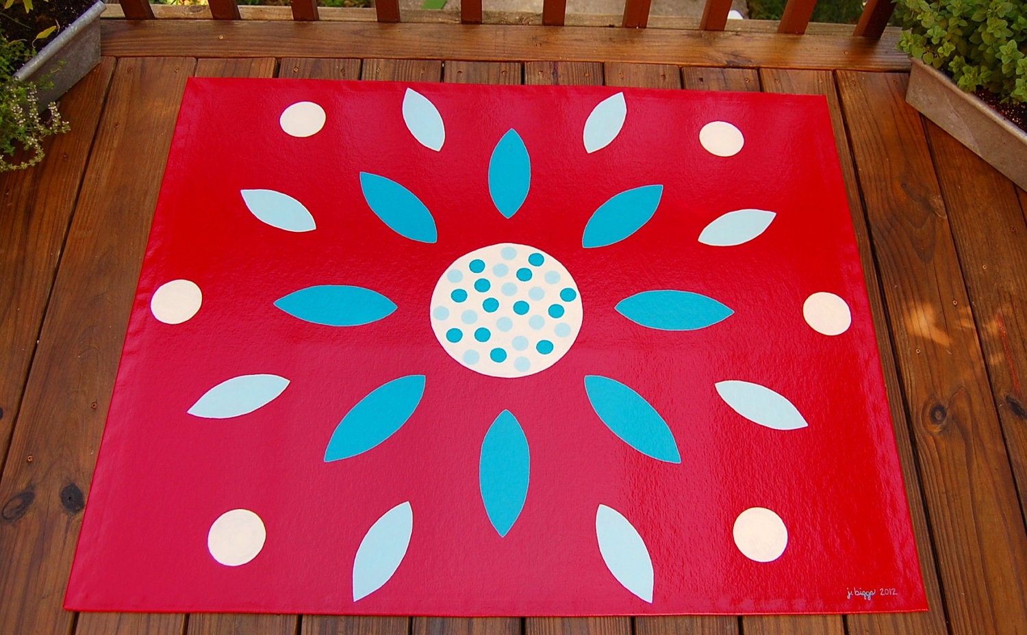 red, aqua, and white flower floorcloth