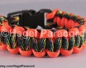 Galaxy with Neon Orange trim cobra weave paracord bracelet