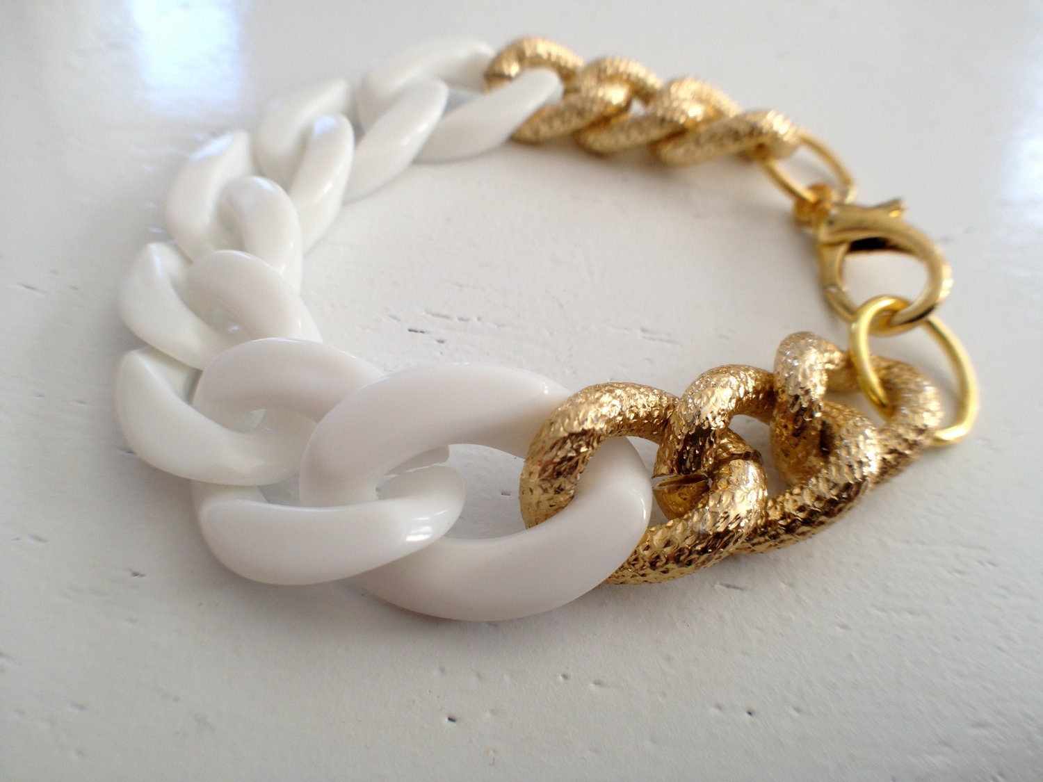 White and gold chain bracelet