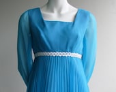Always a Bridesmaid: Short blue 60's mod dress with sheer long sleeves and empire waist