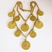 1960s necklace. goldette gold lion coin medallion set. EGYPTIAN GODDESS.