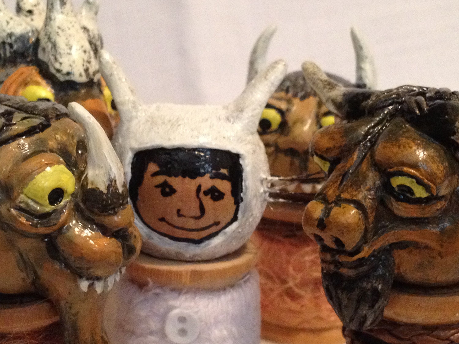 Set of 5 vintage spool dolls based off the book by Maurice Sendak, Where the Wild Things Are. Includes 4 hand sculpted monsters and 1 boy.