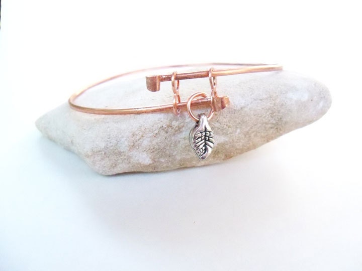 Copper bangle bracelet with pewter leaf drop bead