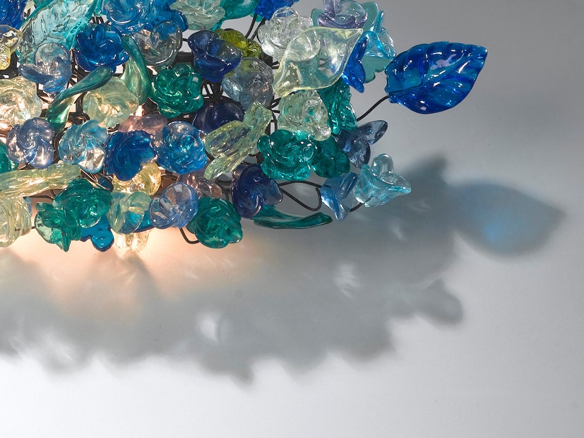 Wall lamp. Blue shades of flowers and leaves.