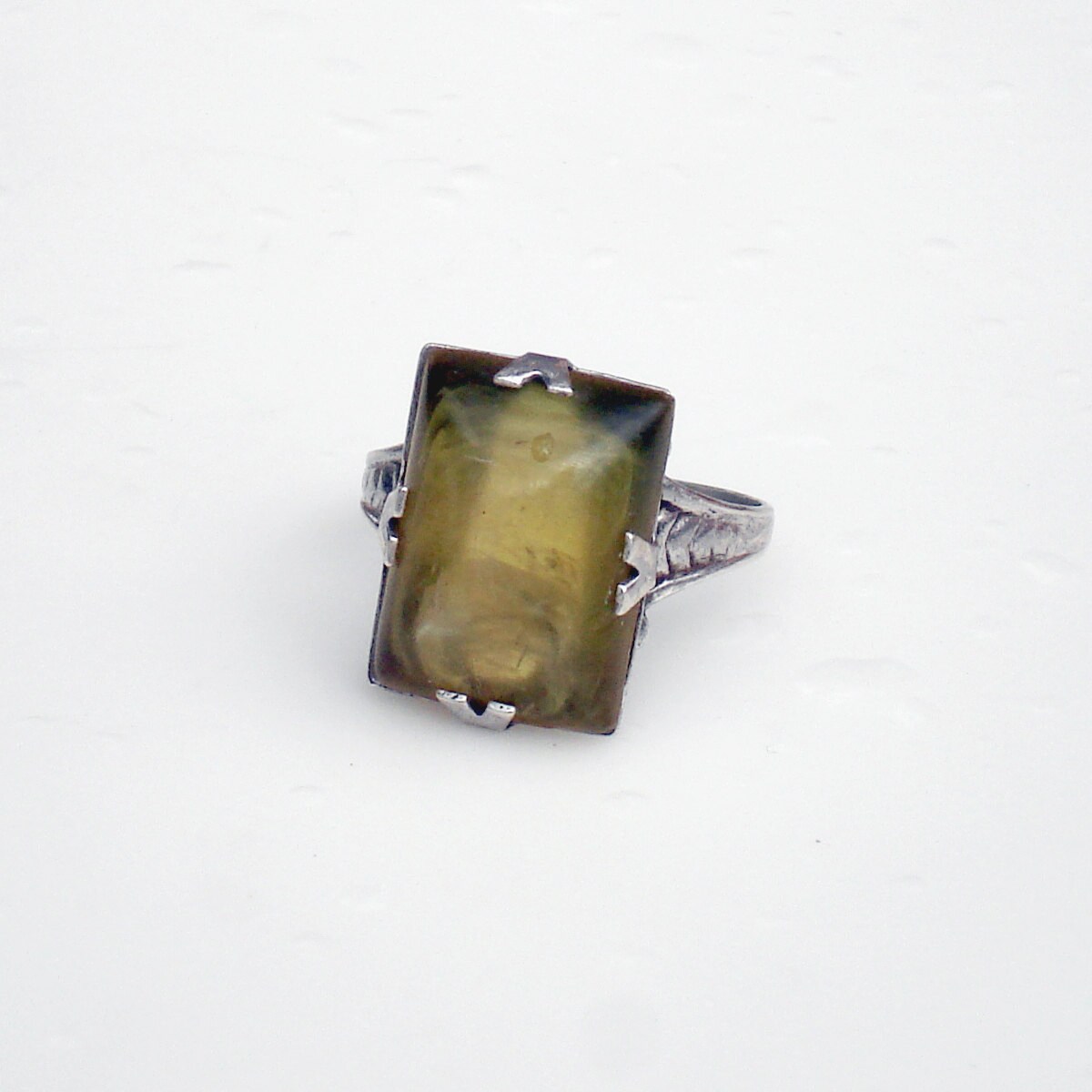 Art Deco Sterling Silver Uncas Ring with Olive Lucite Stone