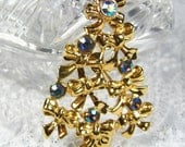 Vintage Holiday Brooch / Pin, Bow Christmas Tree, Gold Tone, Blue Aurora Borealis Rhinestones, Designer AVON, 1980s Jewelry
