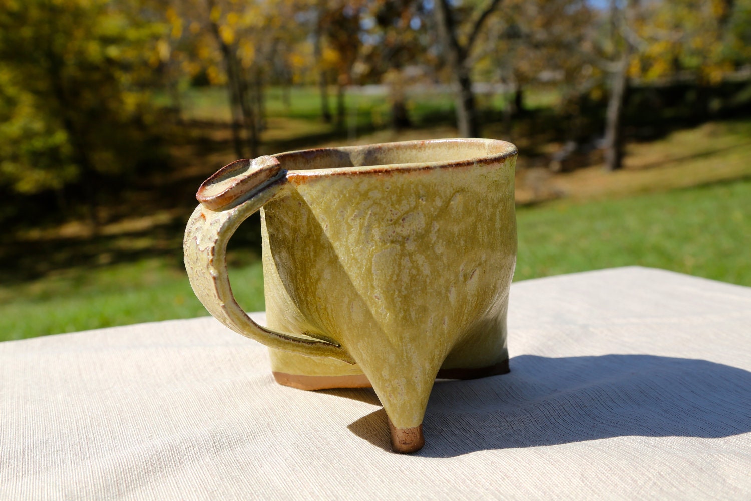 Handbuilt tripod mug