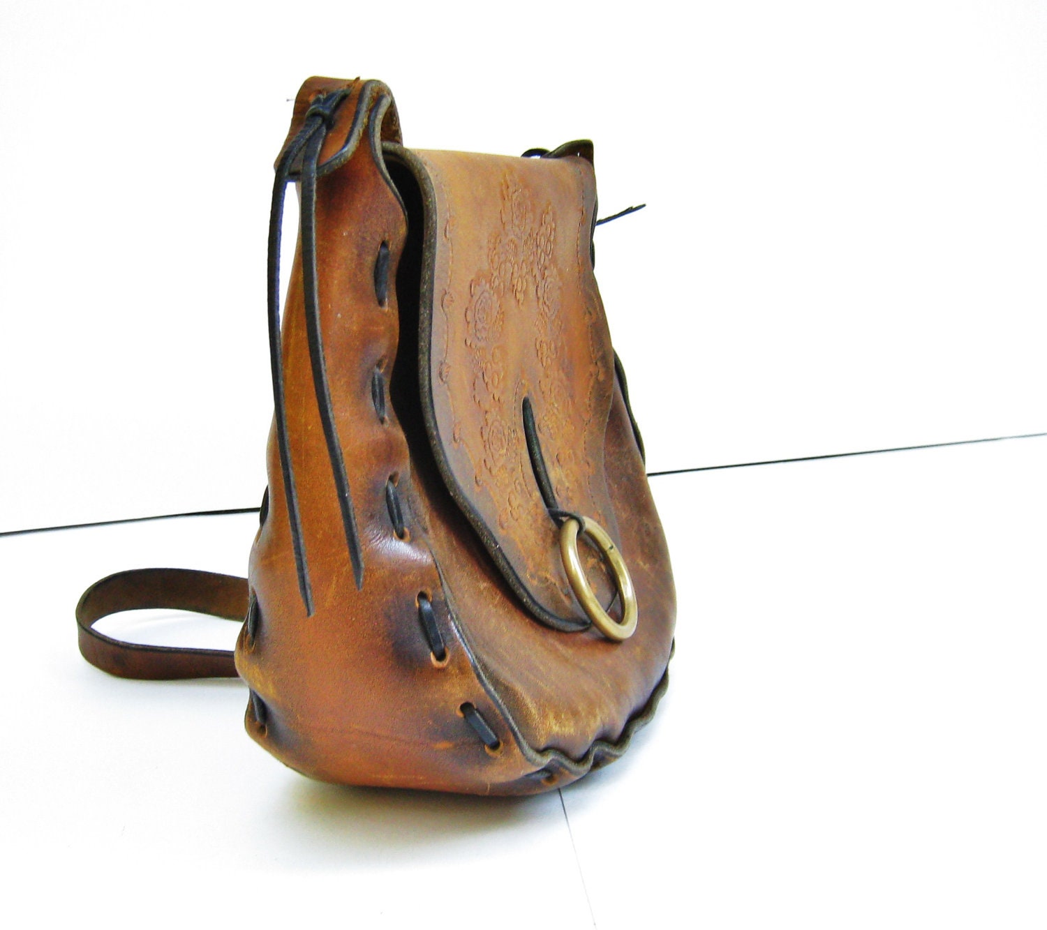 Spring Sale tooled leather bag . metal clasp. 60s & 70s leather purse / boho bag / mid size