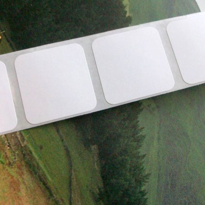 80 blank white labels, 1 inch square, great as price stickers