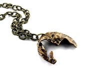 Metal Bronze Necklace.  Original finishing. Stylish design by   Fashion Brand Faina.