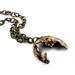Metal Bronze Necklace.  Original finishing. Stylish design by   Fashion Brand Faina.