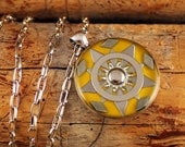 yellow metal star necklace in silver