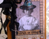 TRICK or TREAT Altered Collage Book with lots of vintage embellishments