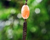 Dragon's egg - dragon vein agate necklace in peach pink.
