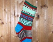 Brightly colored Christmas stocking hand knit fair isle style