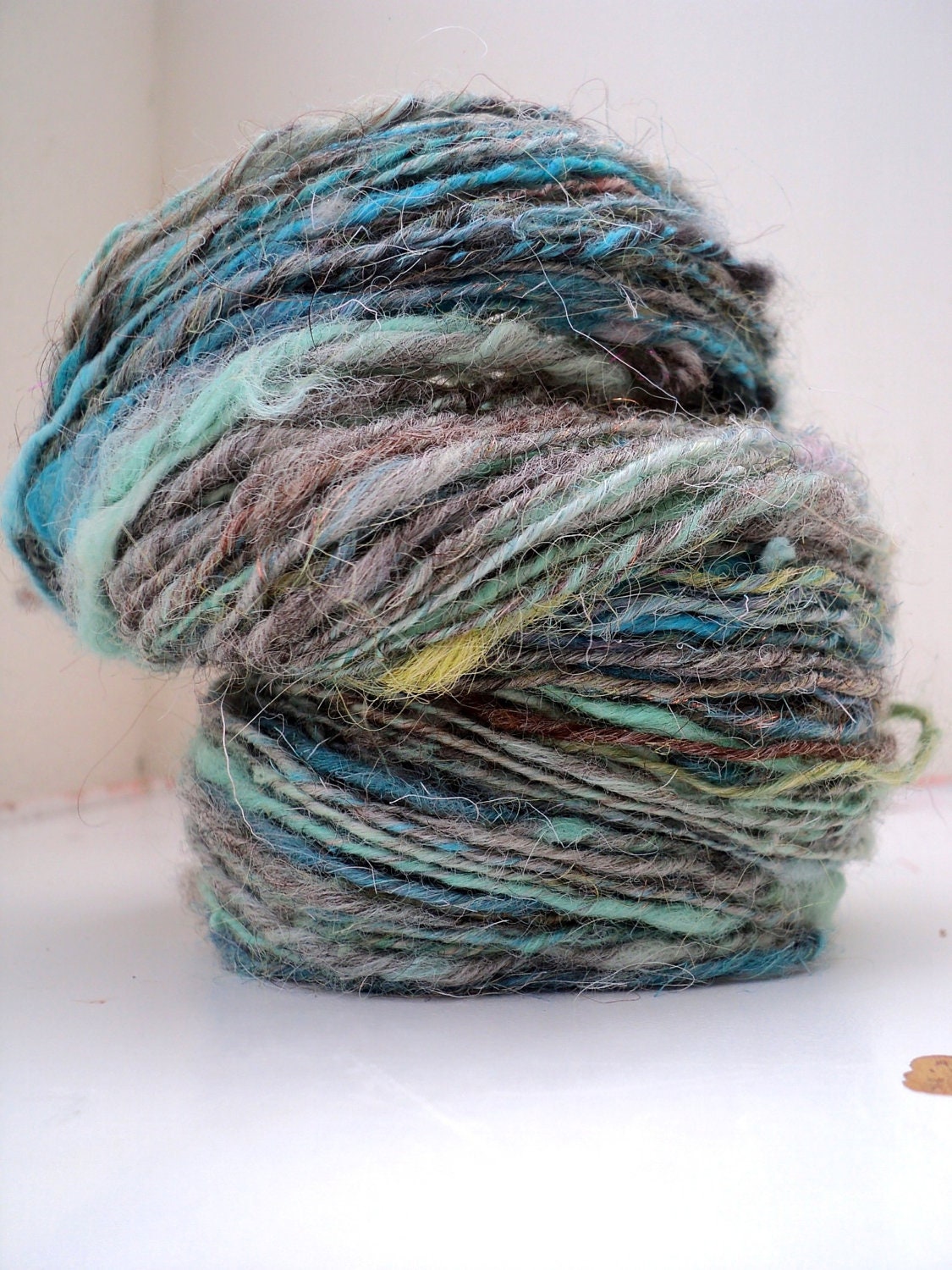 sukoshi : levone ) small batch art yarns, handspun & hand dyed DK singles in blues, grey and greens with sparkle