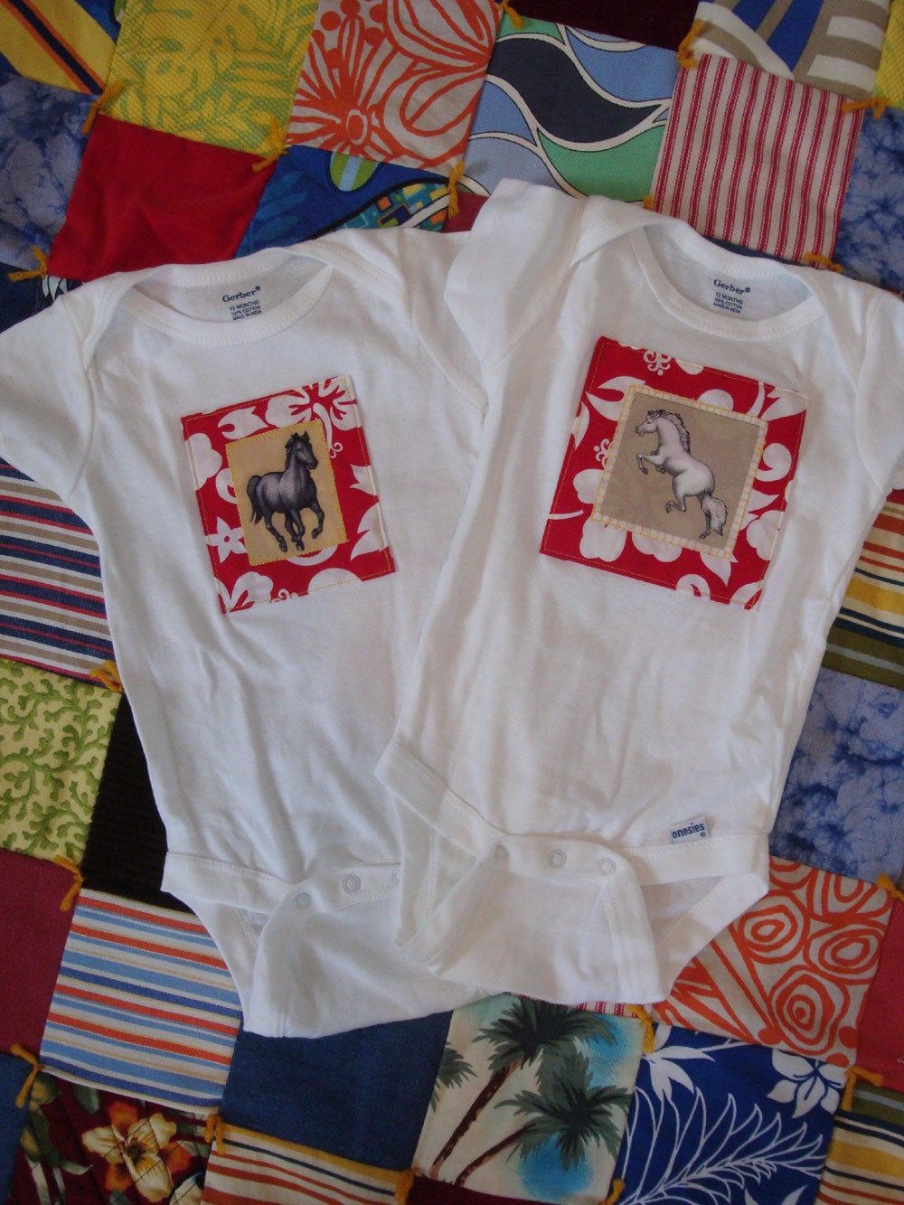 Two Twin hawaiian horse baby onesies size 12 months black and white horses with red hibiscus print
