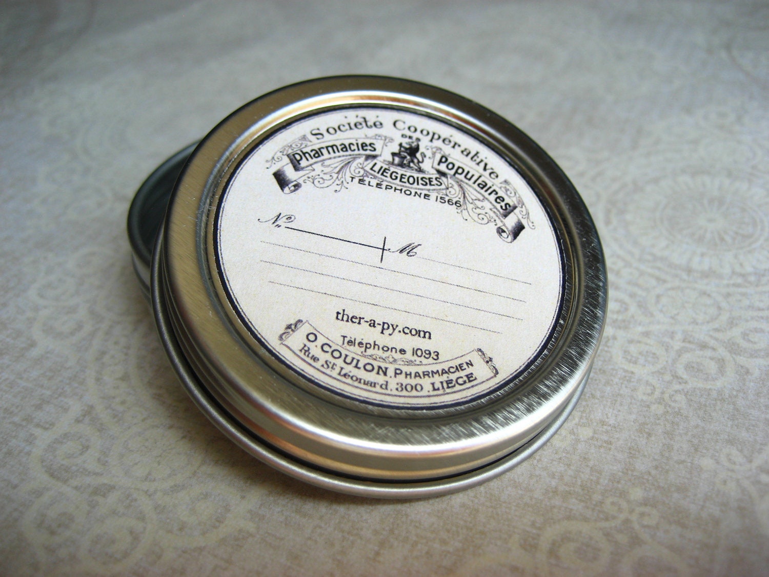 round pill box with vintage french prescription label