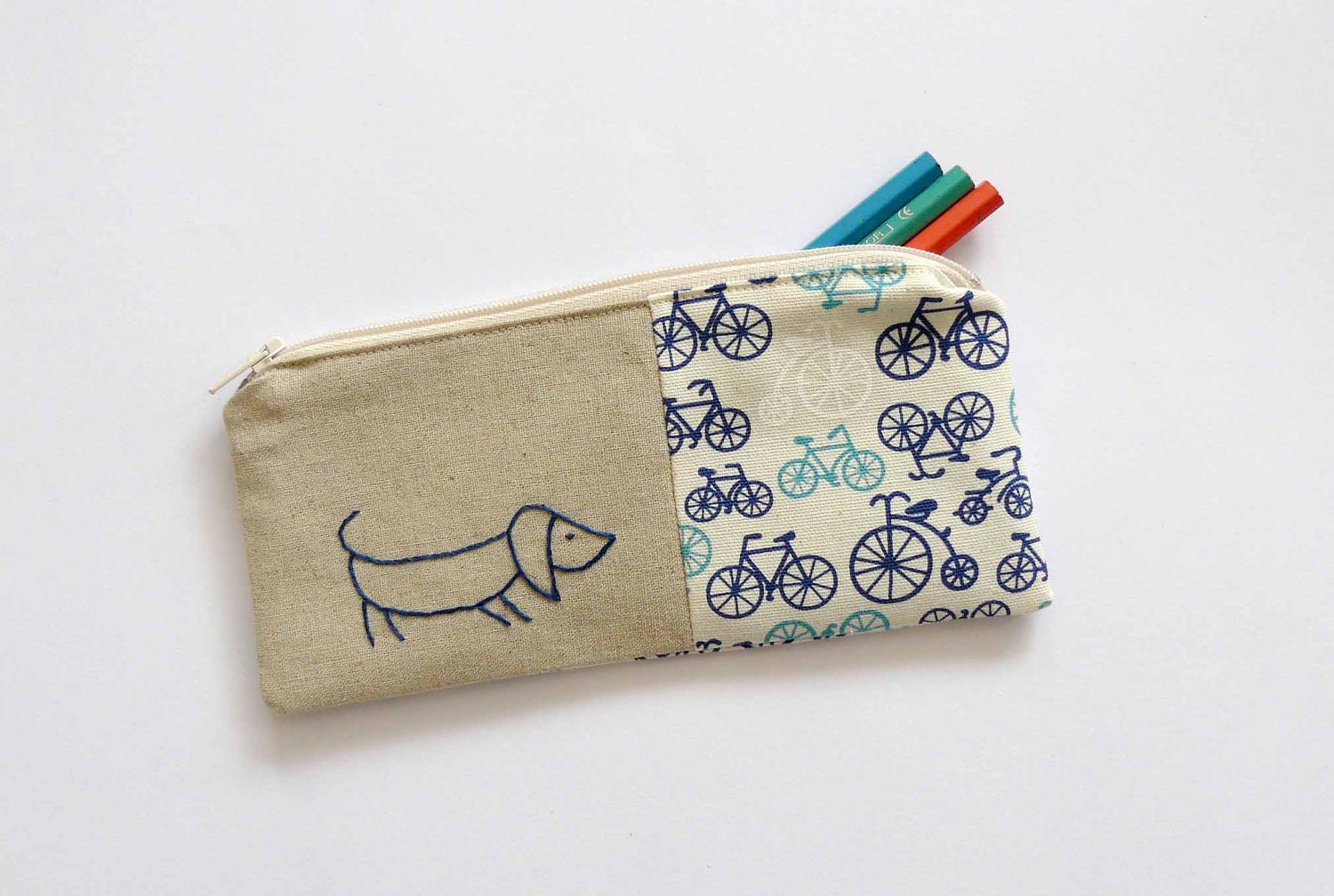 Blue daschund with bikes pencil case or zipper pouch. hand embroidery with bicycle fabric