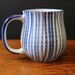 Blue stripes. Vintage stoneware mug.