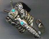Steampunk  Bracelet . Vintage Lobster . Jewel Watch Movement . Animal Cuff . Turquoise Cabochon - Time is Precious  by enchantedbeas on Etsy