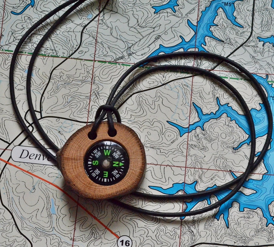 Compass and natural oak tree branch.  Perfect for hikers, hunters, campers, boy scout, girl scouts etc.  Handcrafted......73