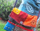Shoulder bag patchwork and hand beaded lots of detail with ceramic bead closure and sun patch OOAK