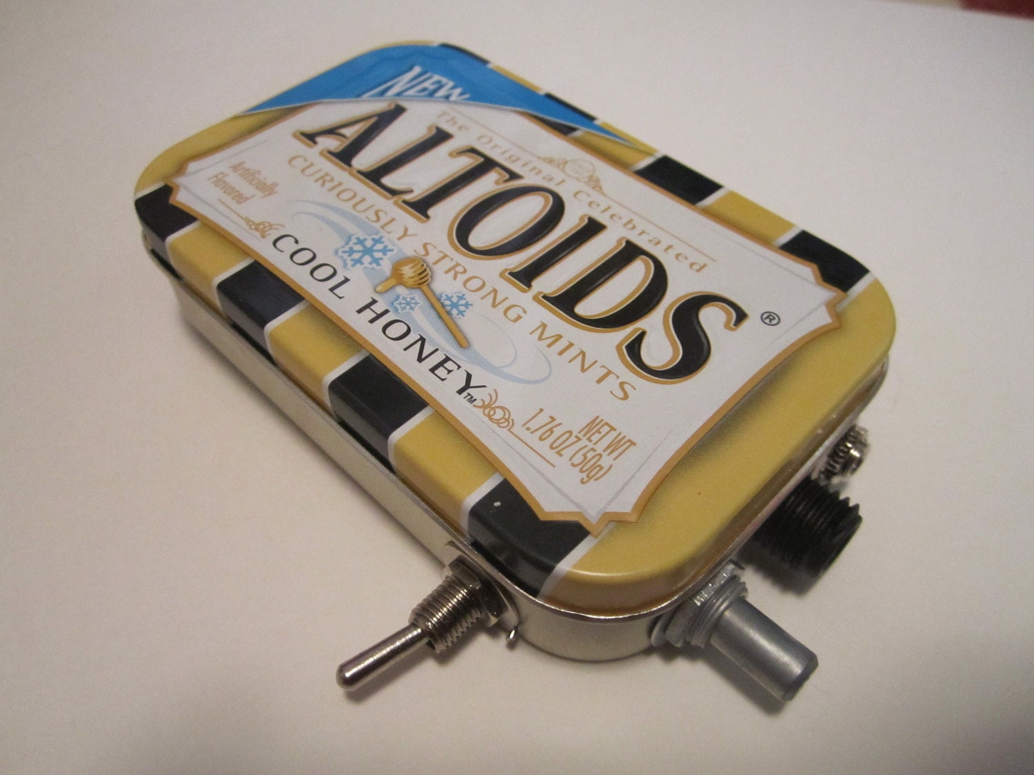Mint Tin Pocket Guitar Amp, Headphone Amp, MP3 Amp w/ Speaker, Volume Control, & 10X Gain (Honey Altoids)