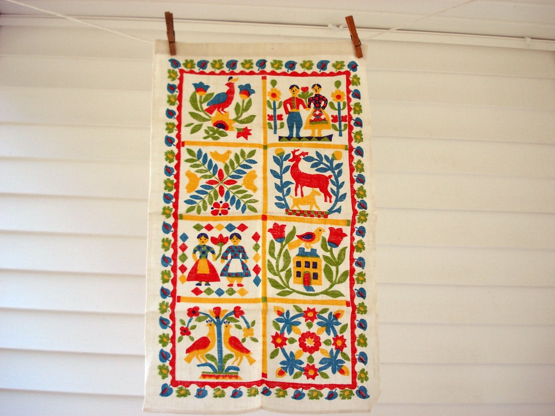 Bright folk art tea towel