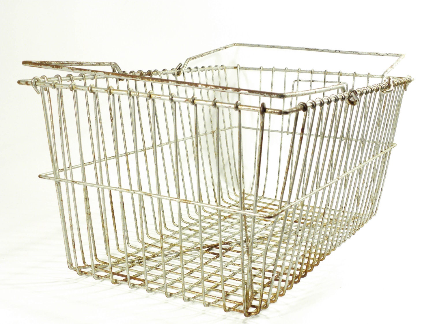 industrial metal basket . old shopping basket or egg and harvest basket . lovely shabby chic . 1950s 1960s farm or bicycle style