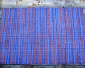 Brilliant blue and red woven rug