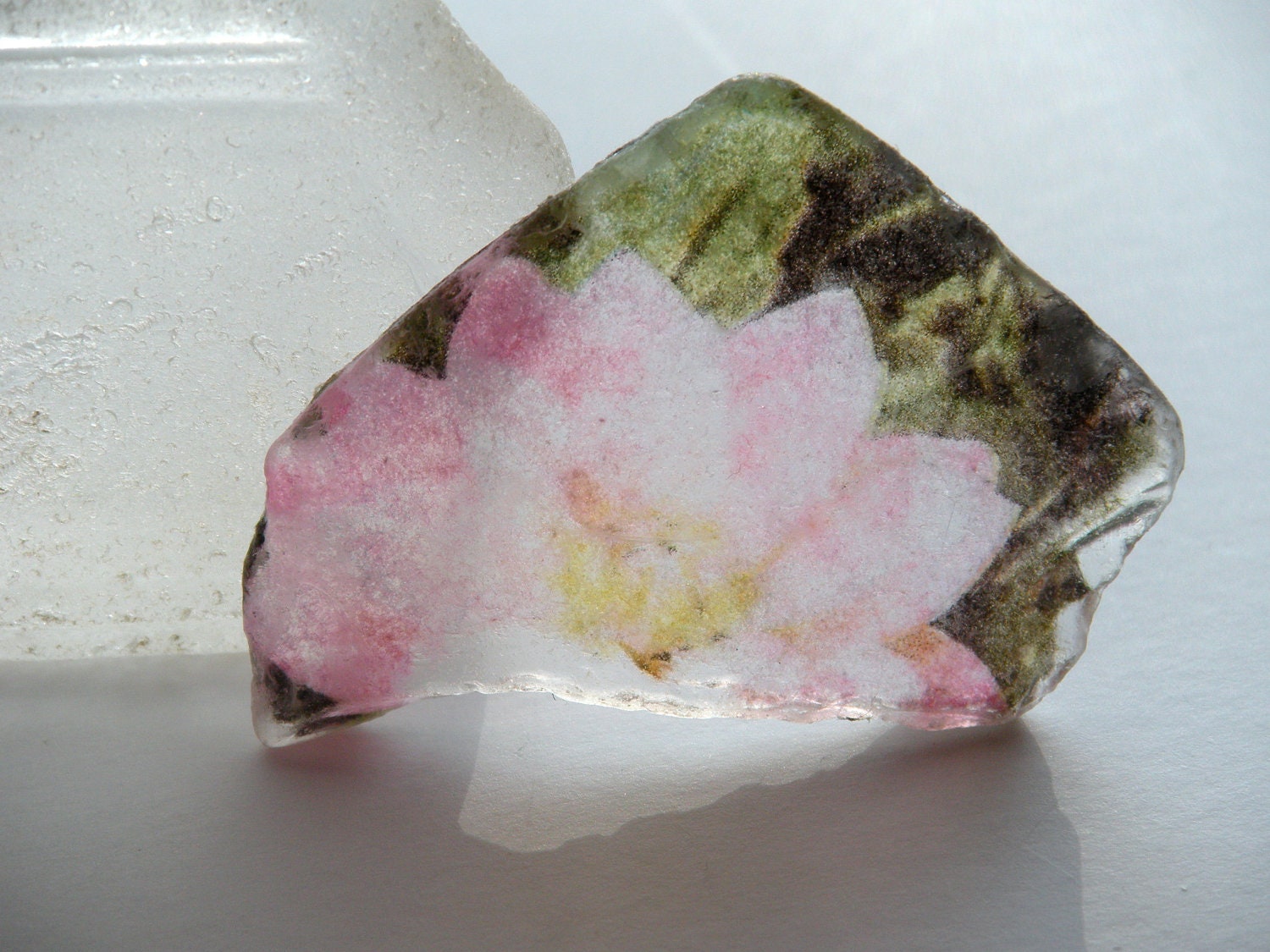 dahlia - image on beach glass, weathered and natural