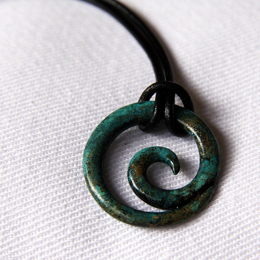Constant Motion Bronze Pendant in Caribbean coral