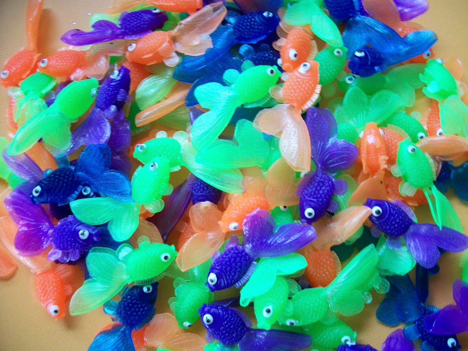 1 Dozen Assorted Vinyl Goldfish: blue, purple, green OUT OF ORANGE