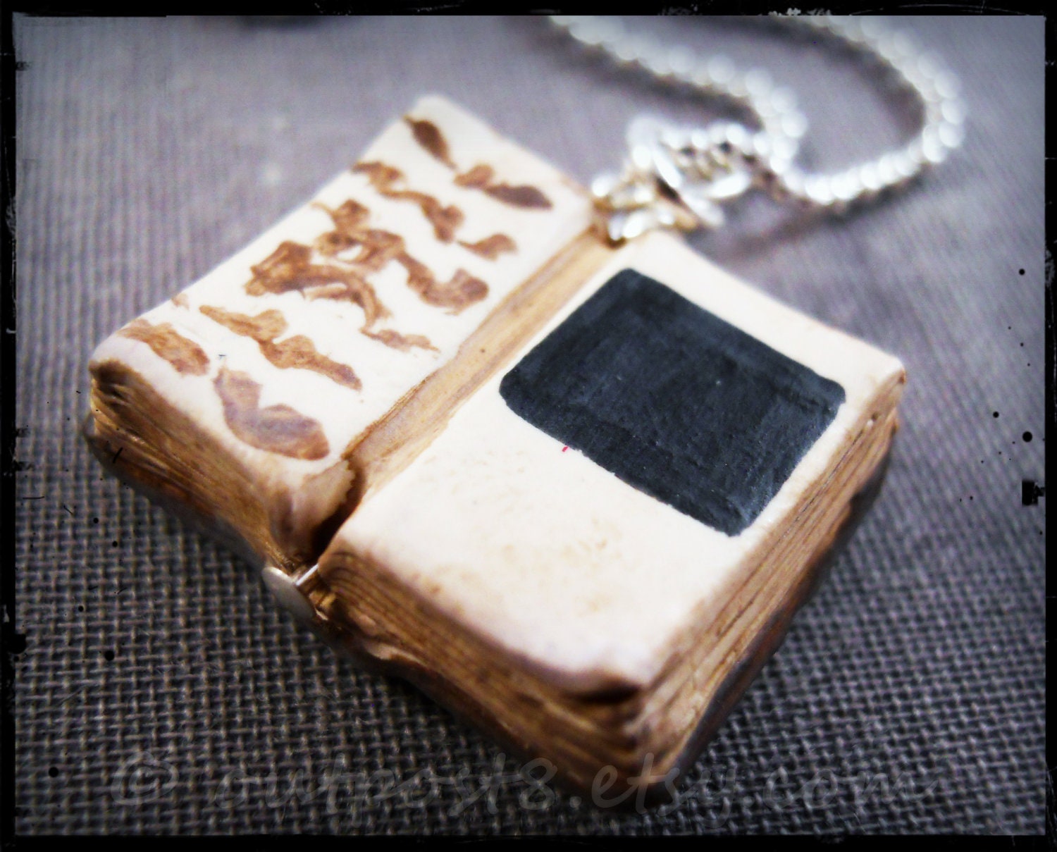 Book of Myst. Polymer clay charm necklace or keychain. Gamer accessory. Free US shipping.