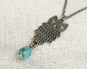 Long owl pendant and turquoise bead necklace.  Antique brass detailed owl and chain.