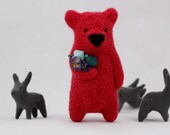 A bright pink bear brooch