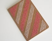 neon pink and white stripes stitched moleskine notebook