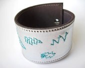 SUPER SALE Silver Metallic Leather Cuff With Teal Lightning Bolt
