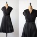 RESERVED. vintage 1970's black wrap dress