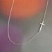 silver sideway cross necklace